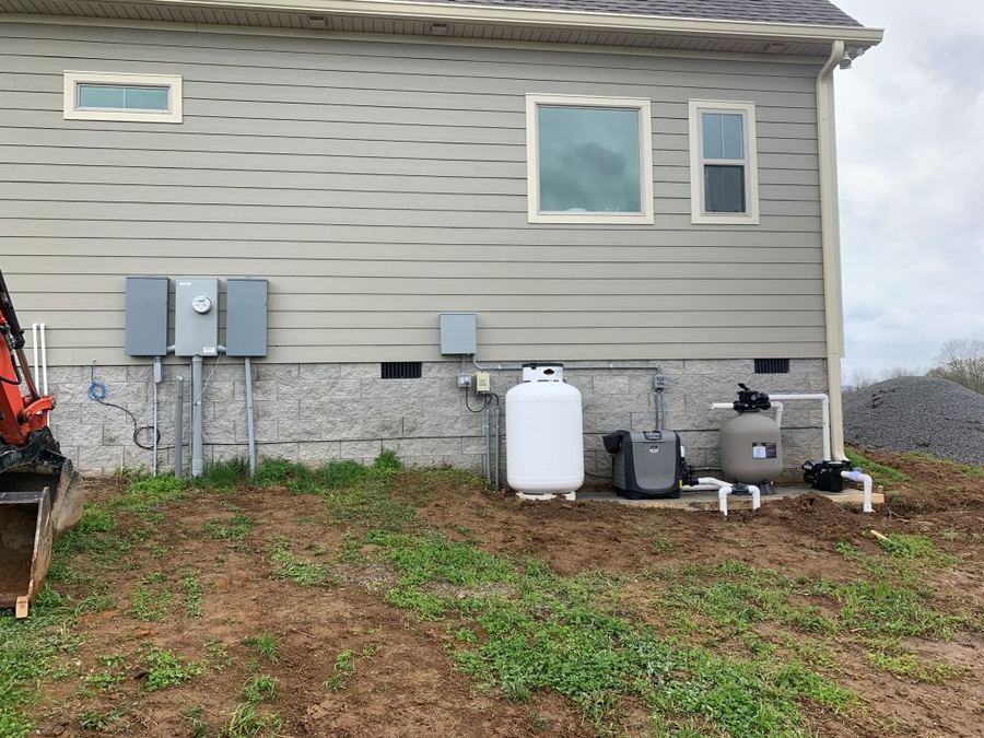Inground pool sub-panel fed from the main service panel, with circuits for pump, heater, and lighting, plus halo bonding, in Lebanon, TN